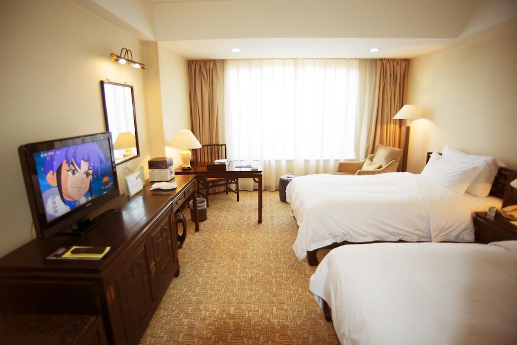Datong Garden Hotel Værelse billede