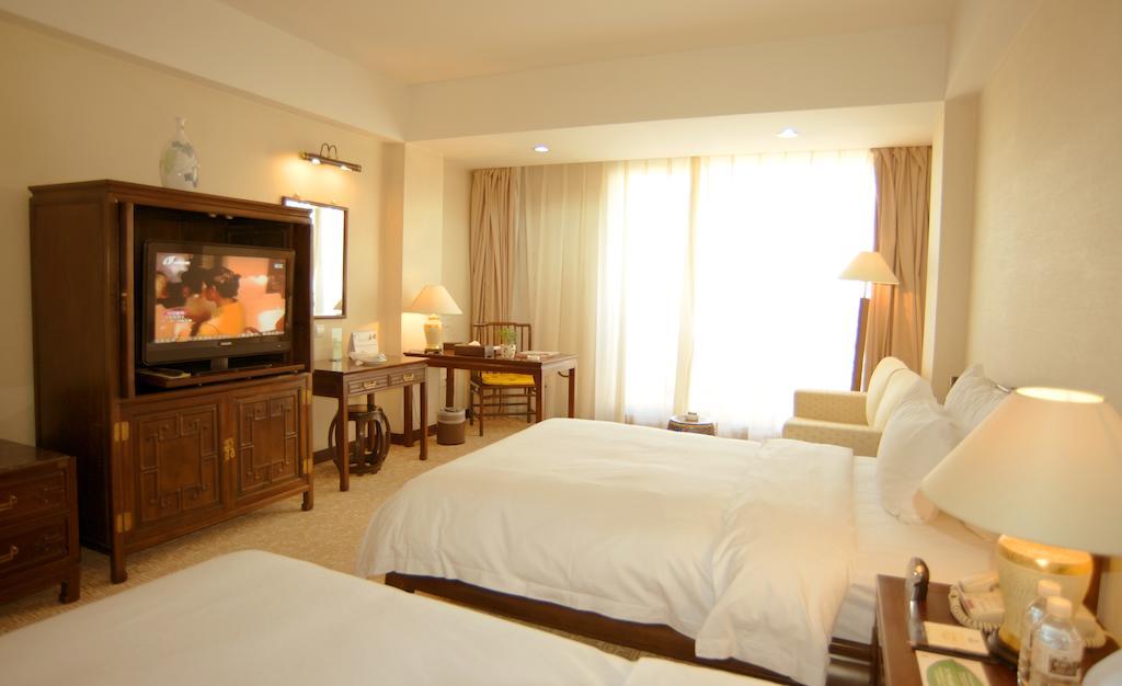 Datong Garden Hotel Værelse billede